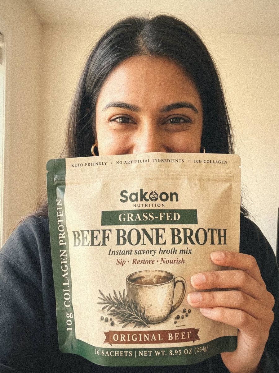 Woman holding the Sakoon pouch over the lower half of her face